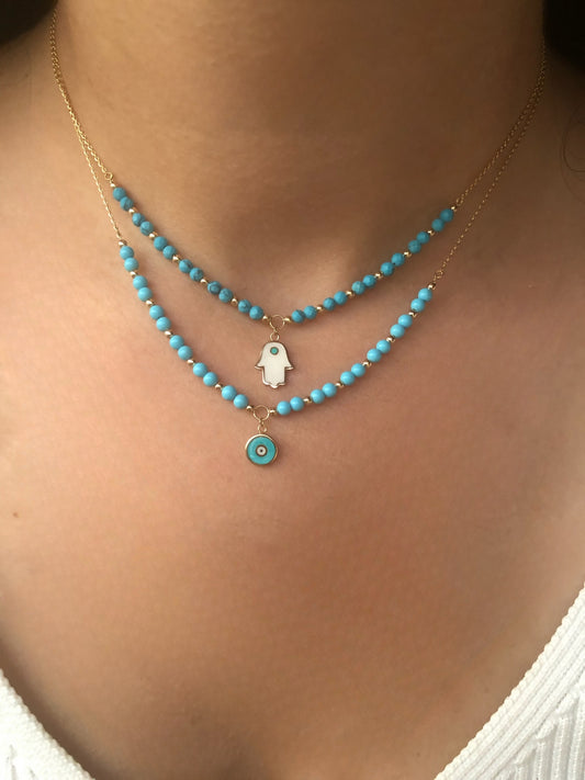 Turquoise gold necklace with gold beads and evil eye charm and hamsa pendant | Ella Creations jewelry