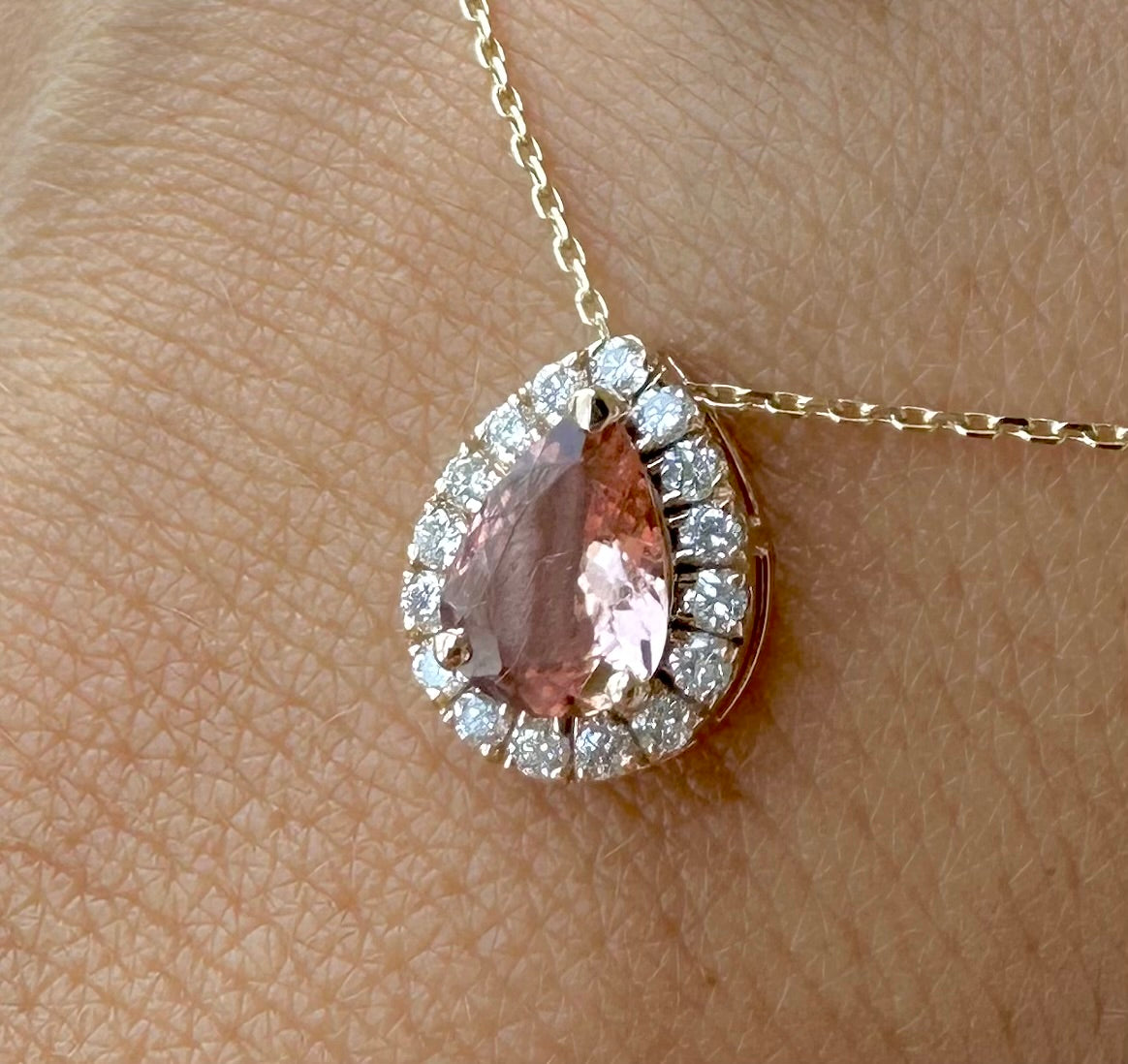 Peach tourmaline 18k rose gold necklace with halo set diamonds