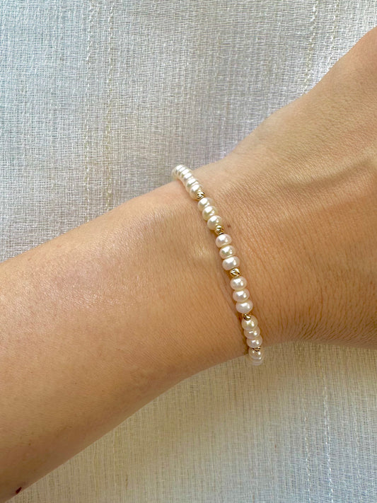 Freshwater Pearls Beaded bracelet featuring 18 karat faceted beads and findings.&nbsp; Available with a chain extender for a comfort wear. | Ella Creations Jewelry