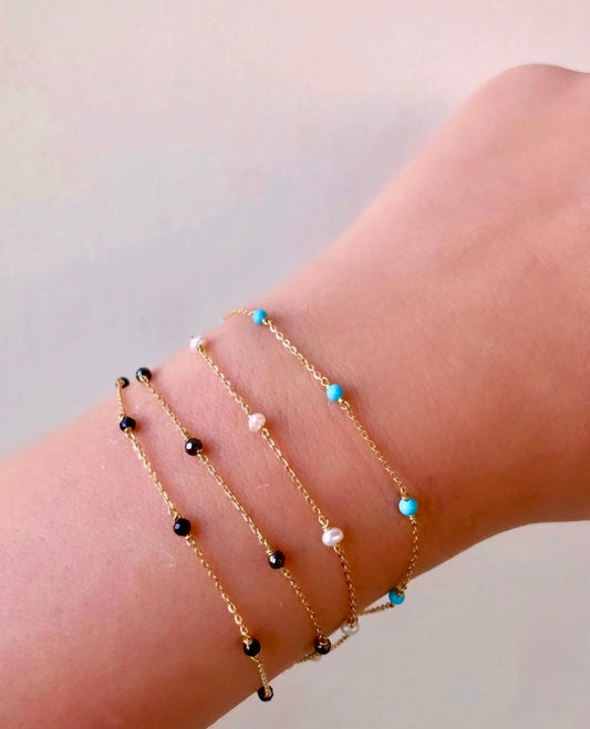 Dainty gold bracelet with beads
