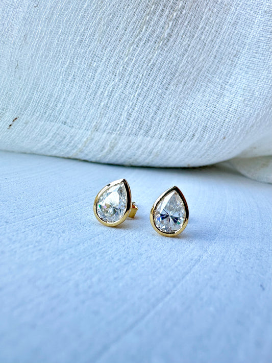 Moissanite Stud Earrings in pear shape handcrafted in 18karat gold | Ella Creations Jewelry