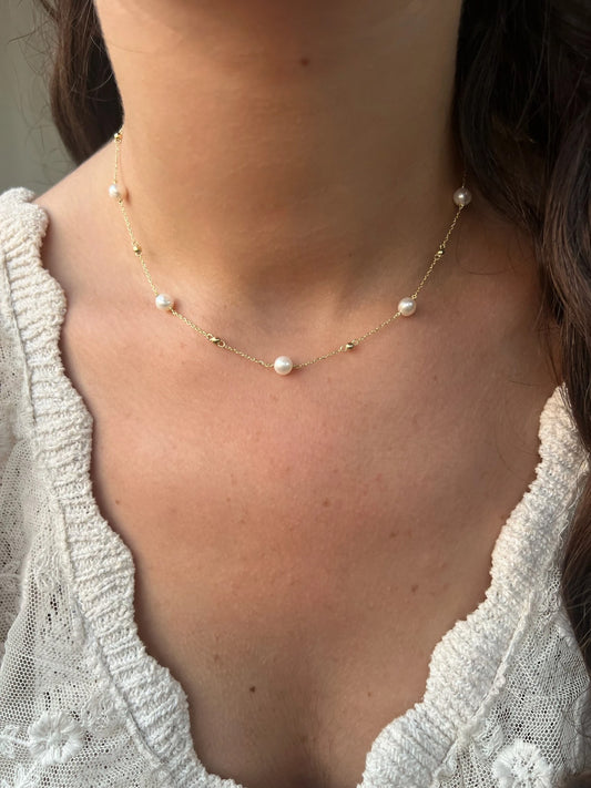 18k gold pearl station necklace with gold beads in-between the pearls | Ella Creations Jewelry