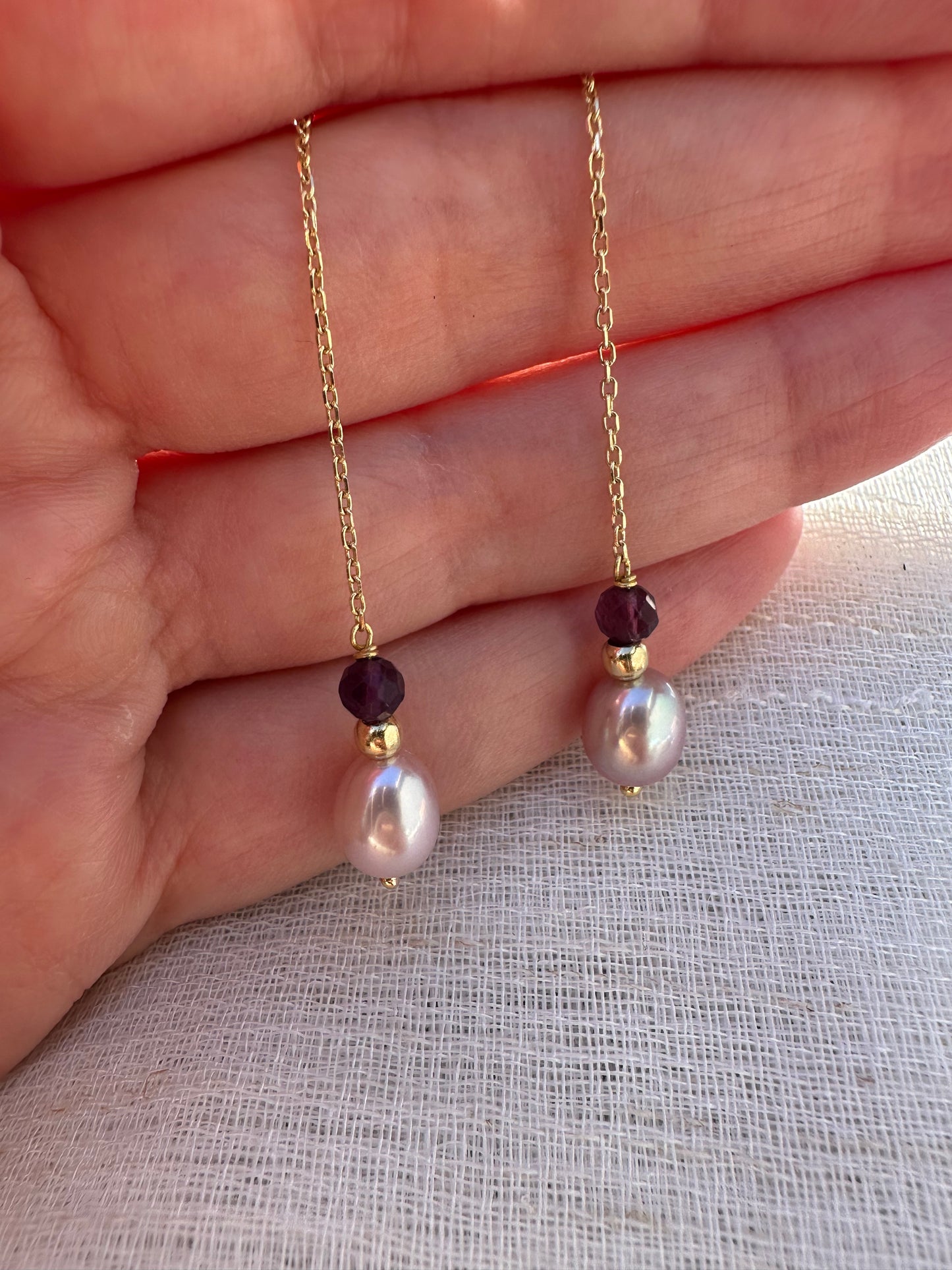 Threader Earrings handcrafted in 18 karat gold, featuring Pink pearls, a gold bead and a garnet bead, with a total length of 4.7" these earrings are perfect for a night  or an elegant casual look | Ella Creations Jewelry