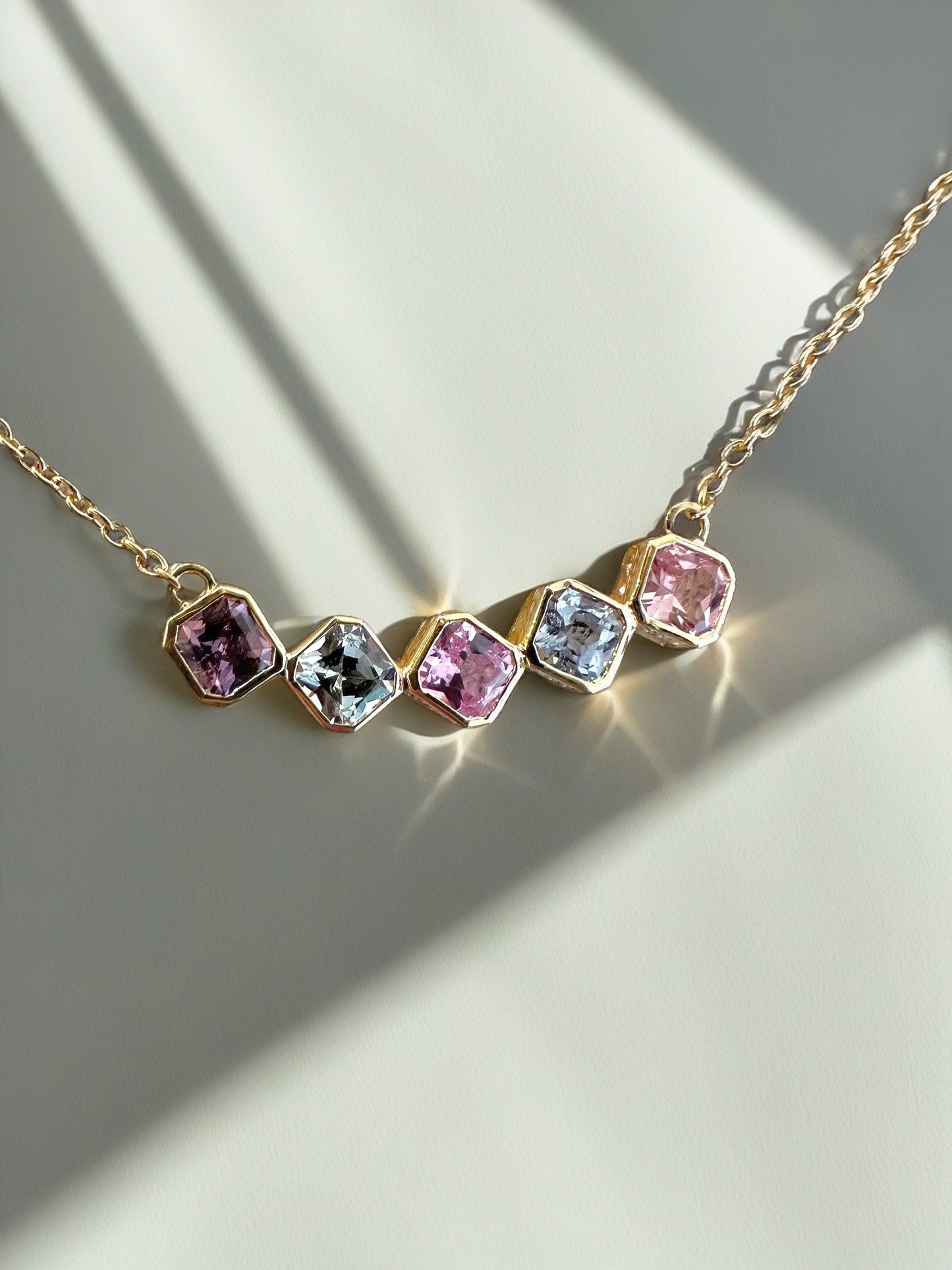 Gold Sapphire necklace handcrafted in 18 karat gold featuring multicolor sapphire in asscher cut | Ella Creations Jewelry