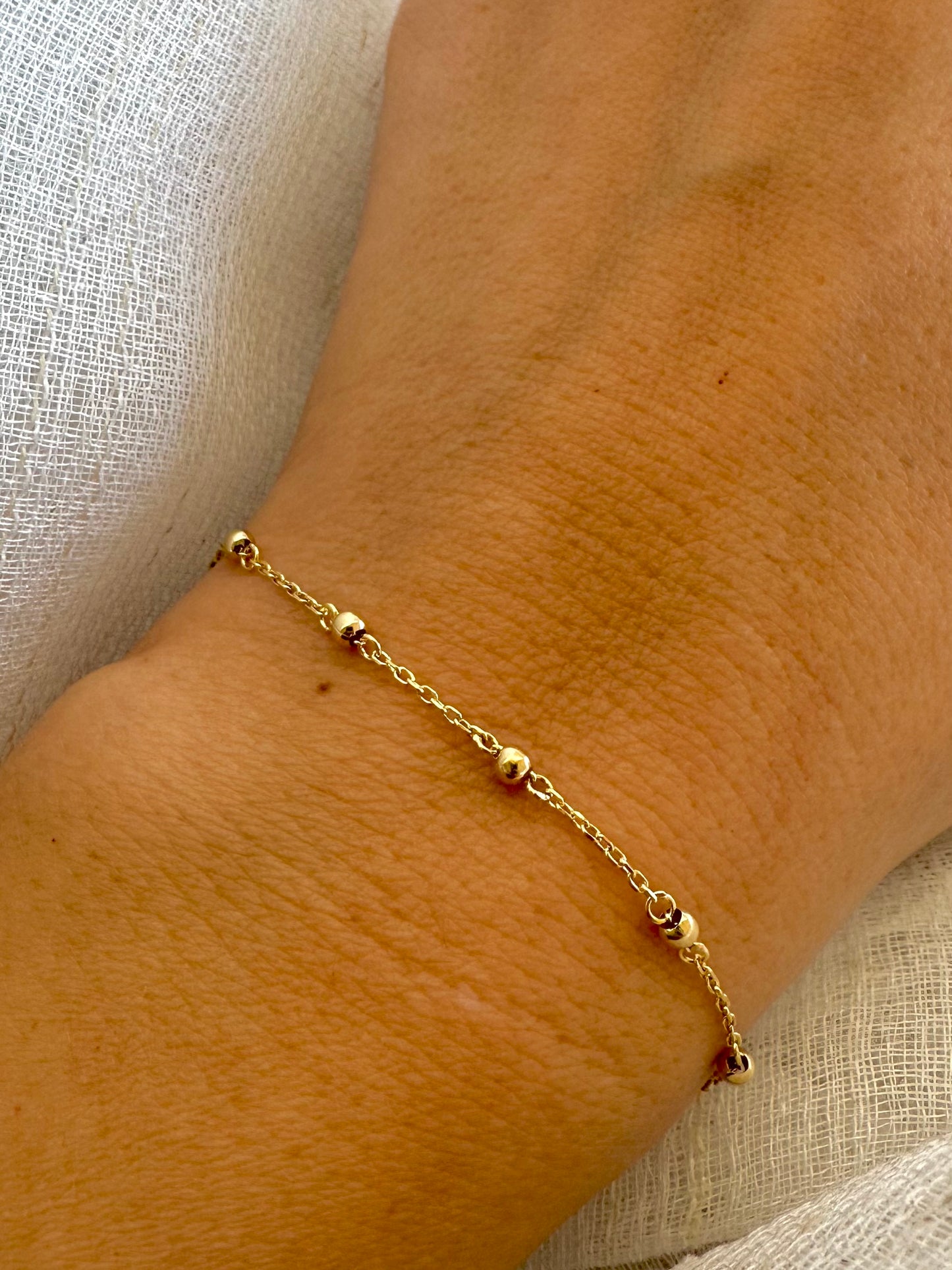 Simple Gold bracelet is perfect for a minimalistic stand alone look or for stacking with other bracelets. crafted from 18k gold | Ella Creations Jewelry