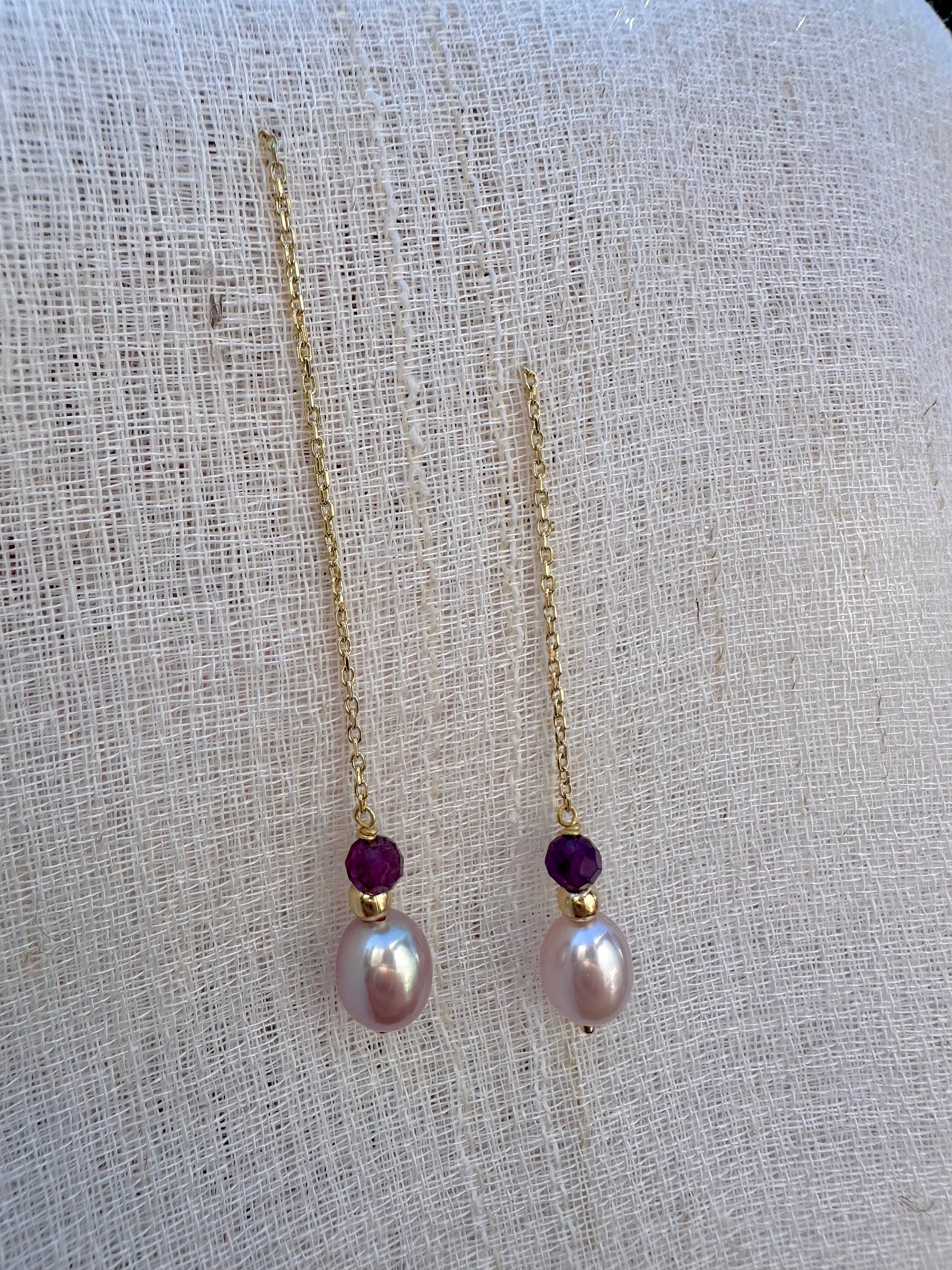 Threader Earrings handcrafted in 18 karat gold, featuring Pink pearls, a gold bead and a garnet bead, with a total length of 4.7" these earrings are perfect for a night  or an elegant casual look | Ella Creations Jewelry