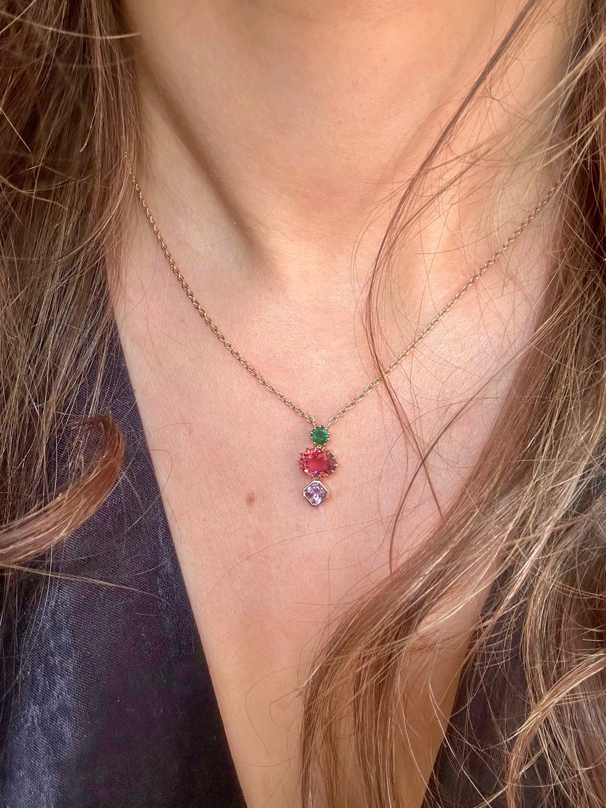 Three Stone necklace handcrafted in 18 karat gold featuring: emerald, sapphire and tourmaline | Ella Creations Jewelry