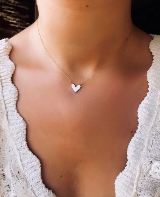 white Gold Heart Necklace handcrafted in 18k gold, offering a dual design: enamel at on one side and plain gold at the other side| Ella Creations jewelry