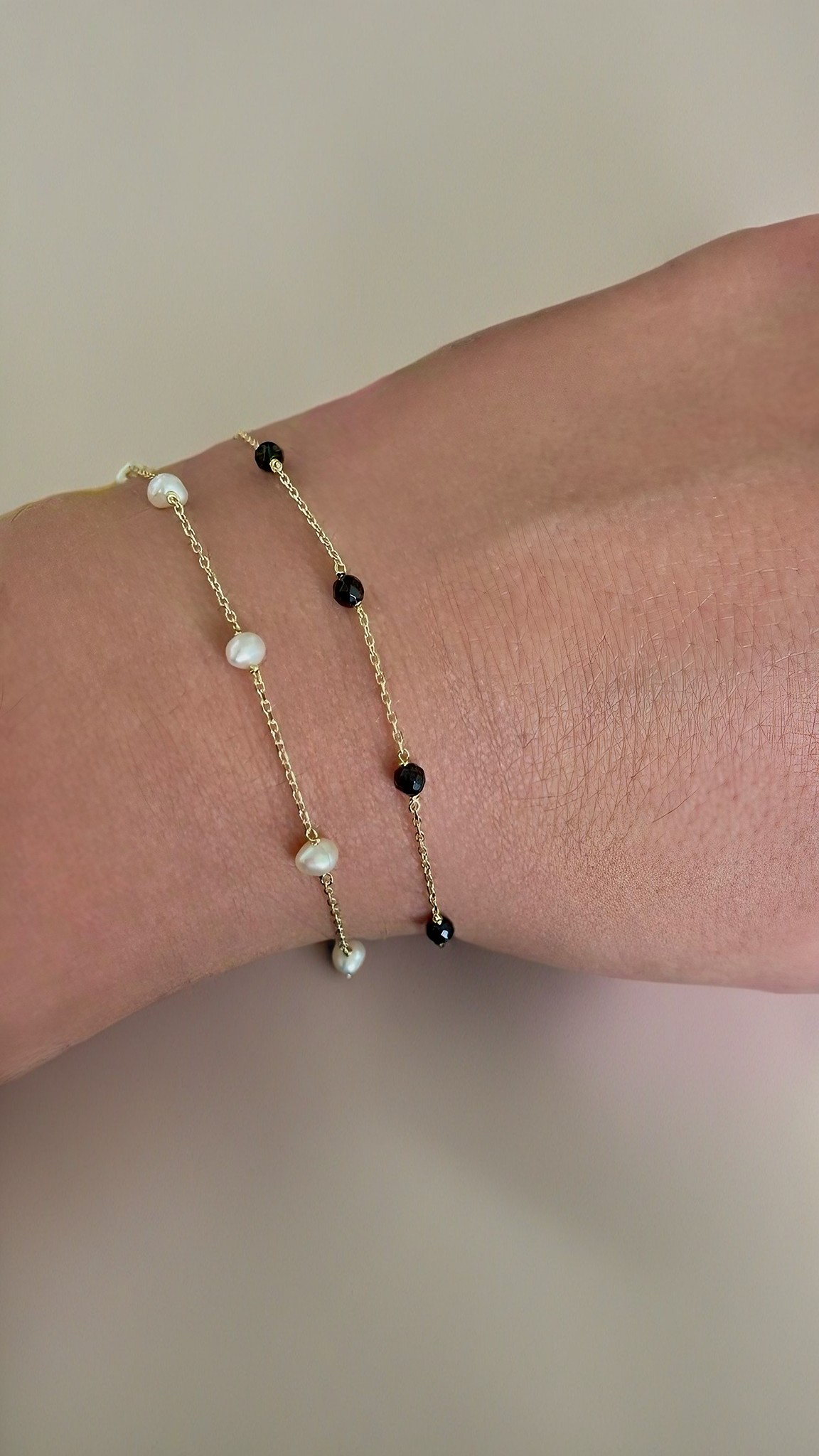 Exquisite Small gold bracelet handcrafted in 18 karat gold and adorned with 8 tiny beads. Select among: Turquoise, freshwater pearls, Black Onyx and hematite. Designed for versatility, this tiny beads bracelet is perfect for a minimalistic look or for stacking with other bracelets. | Ella Creations Jewelry