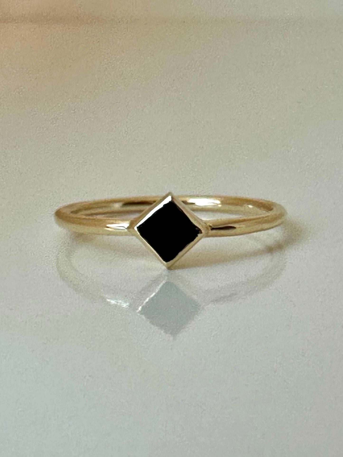 Elegant and dainty Rhombus rings,  Handcrafted in 18k solid yellow gold, each features a thin band ring with a unique Rhombus bezel setting that showcases Black Onyx stone | Ella Creations Jewelry