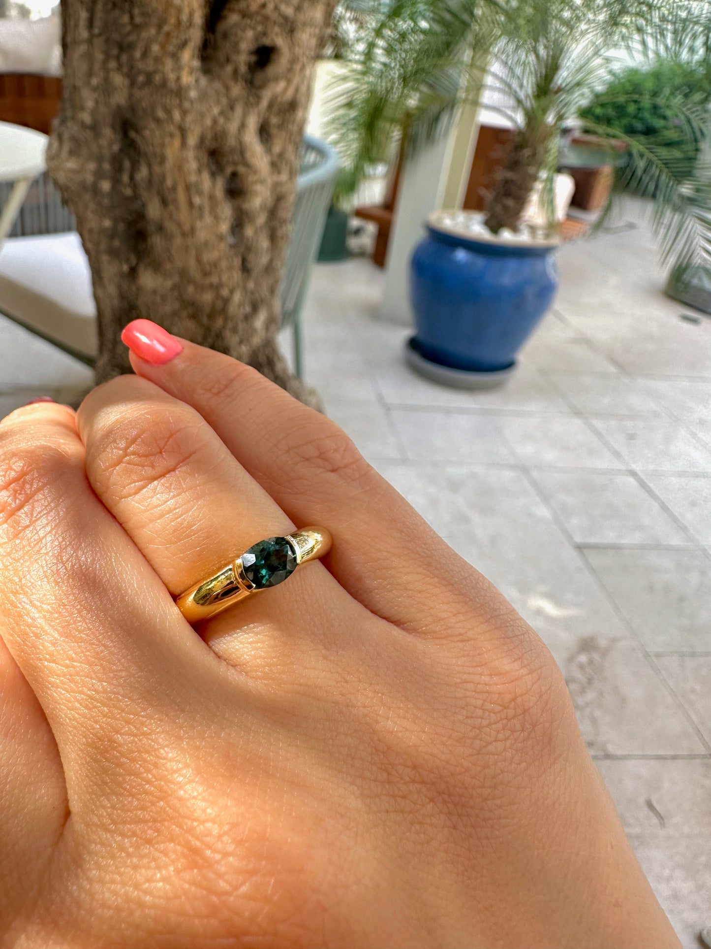 Blue Tourmaline ring featuring a blue tourmaline 1ct stone at its center, half bezel set and handcrafted in 18k gold | Ella Creations Jewelry