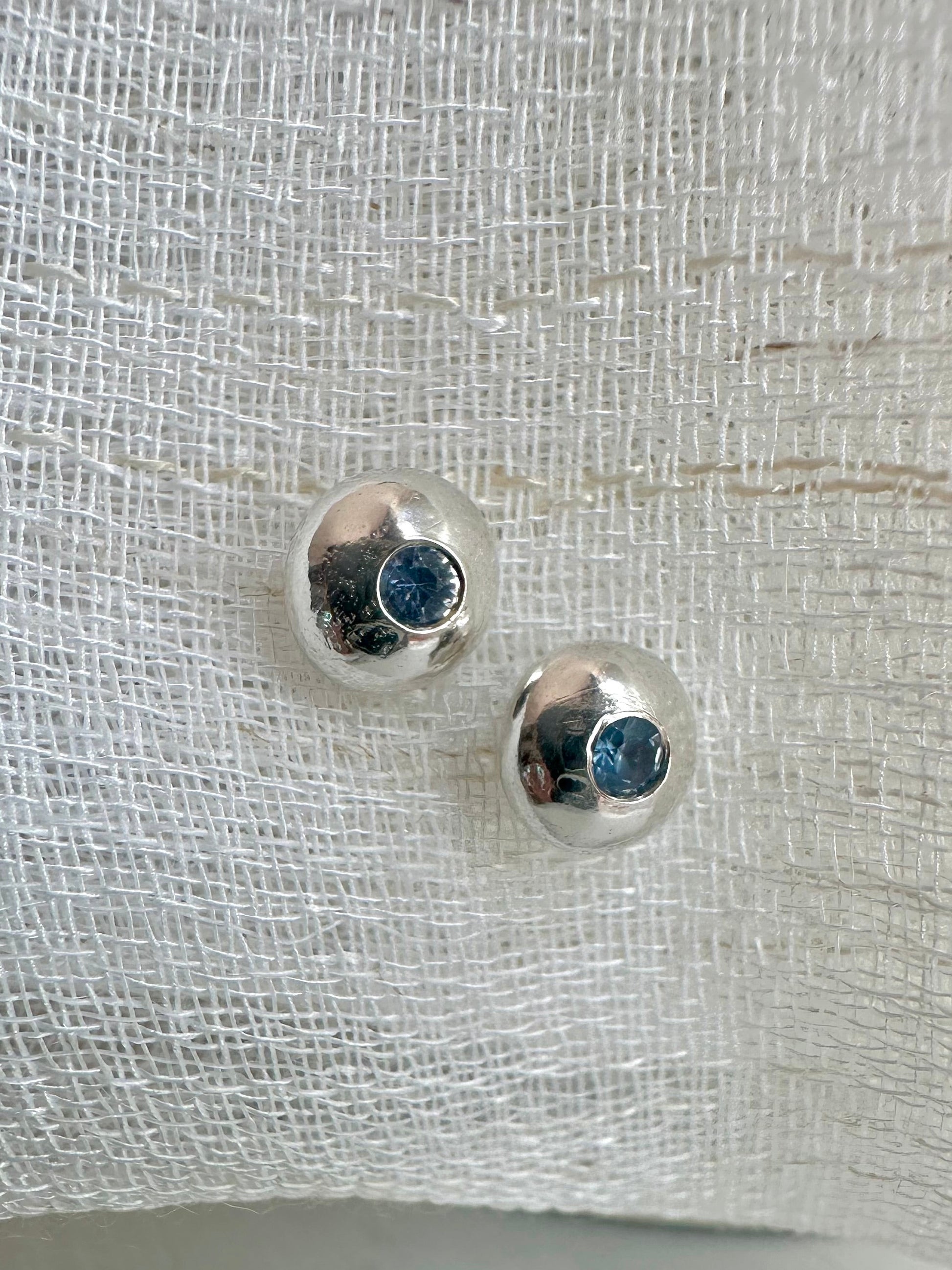 Button handcrafted recycled sterling silver with a flushed sapphire center stone | ella Creations Jewelry 