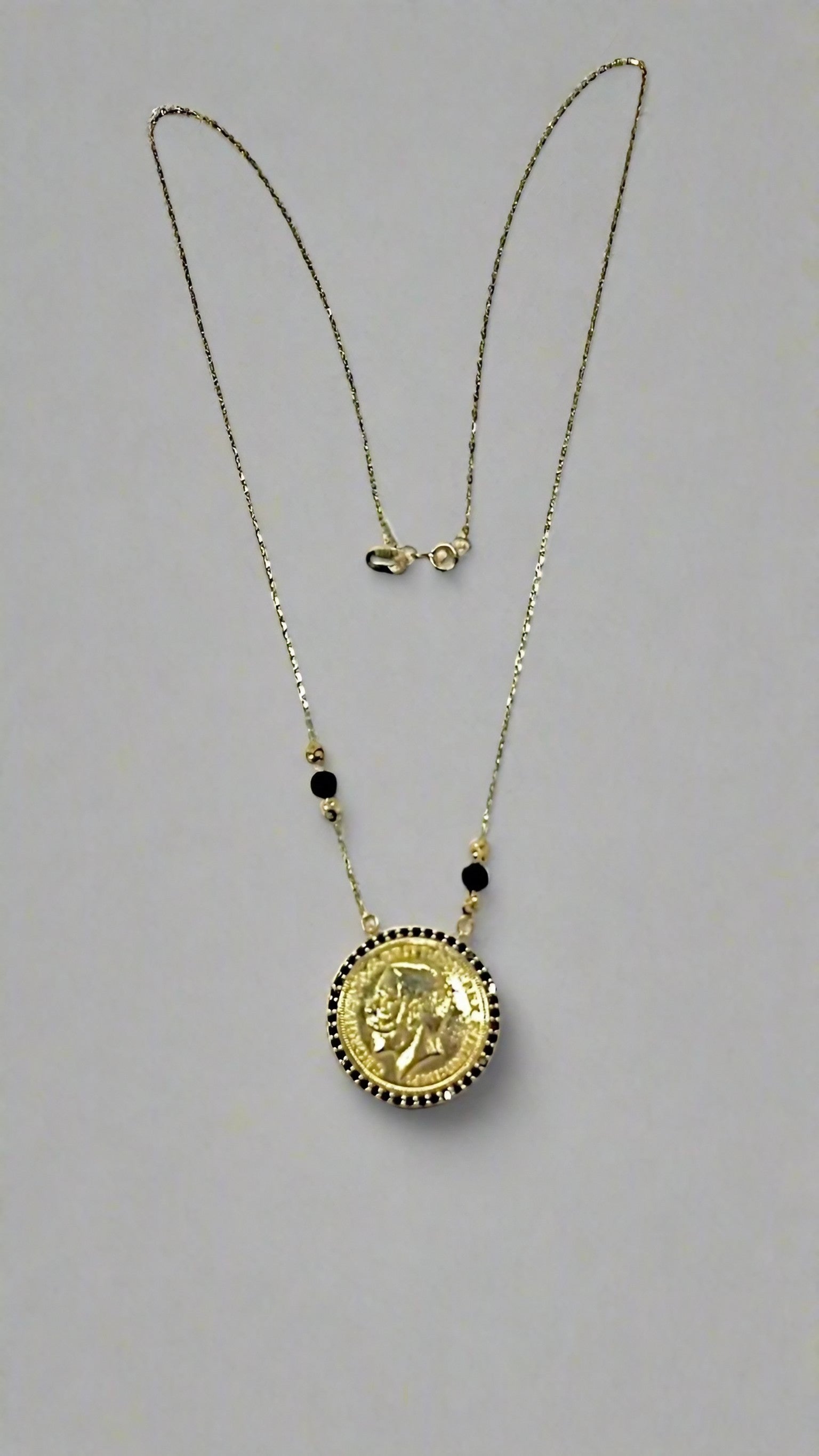 Coin Gold Necklace with black halo diamonds handcrafted in 18 karat gold | Ella Creations Jewelry