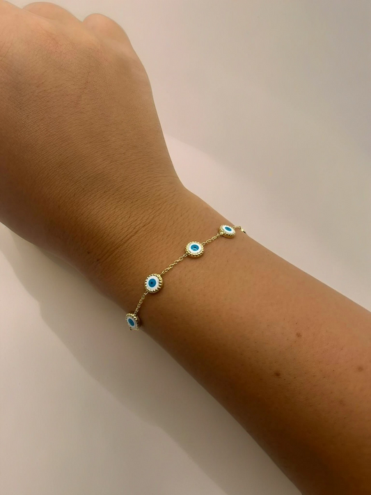 Evil Eye gold bracelet with five charms ideal for protection | Ella Creations Jewelry