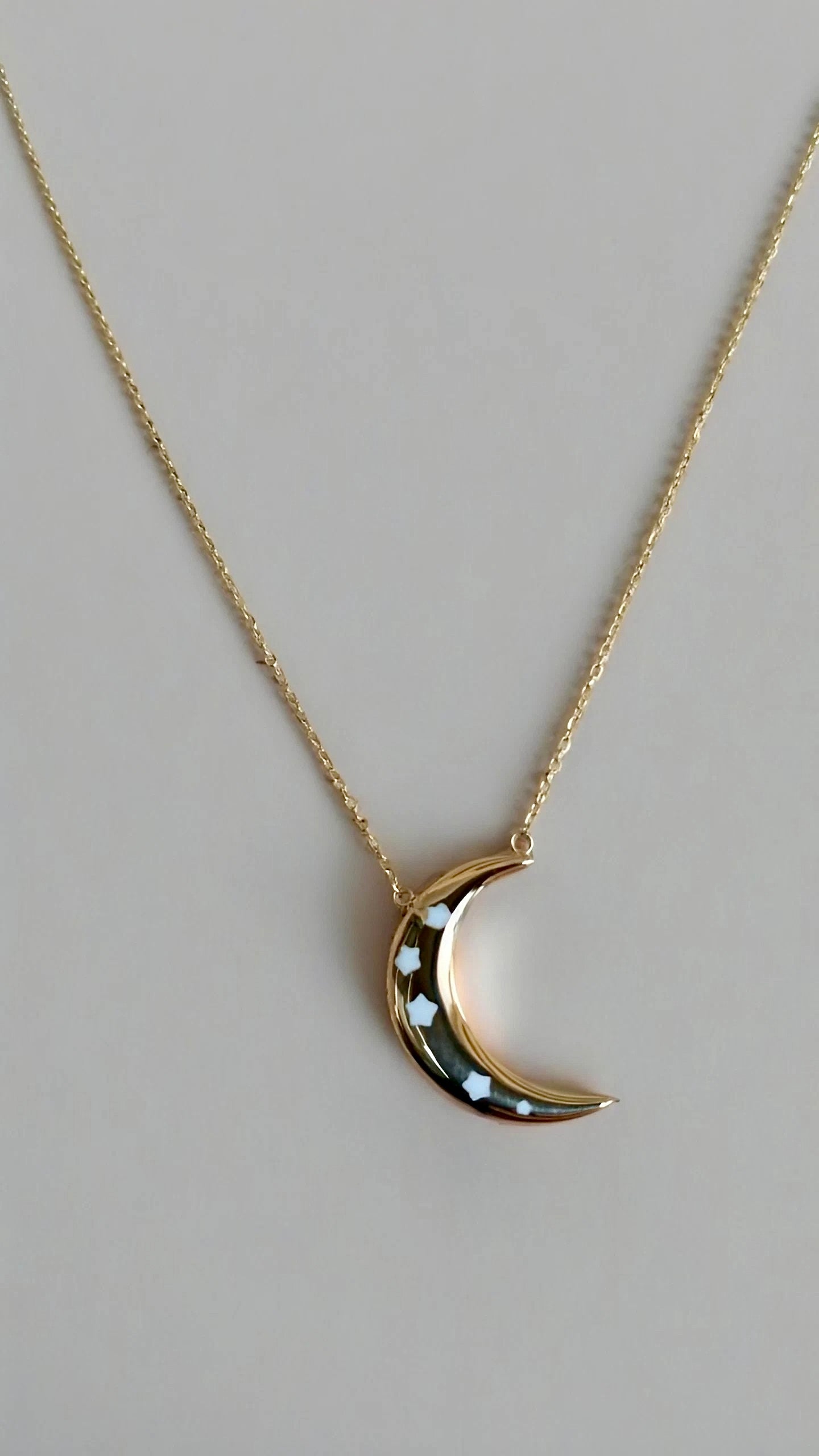 Gold Moon Necklace, enameled gold moon with stars and different sides | Ella Creations Jewelry