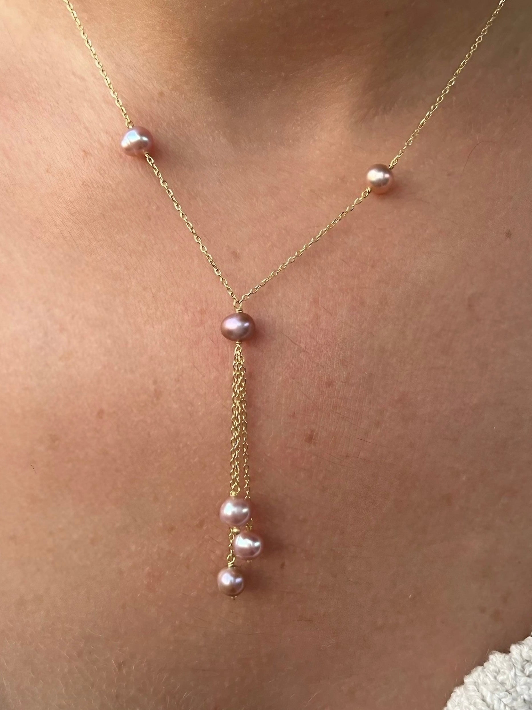 Exquisite Pearl Drop Necklace, featuring an 18k gold chain with Pink Pearls, one at each side of the chain and with drop Style Pink Pearls. This Necklace can be ordered in 18K Yellow gold or 18k Rose gold.