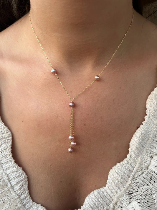 Exquisite Pearl Drop Necklace, featuring an 18k gold chain with Pink Pearls, one at each side of the chain and with drop Style Pink Pearls. This Necklace can be ordered in 18K Yellow gold or 18k Rose gold.