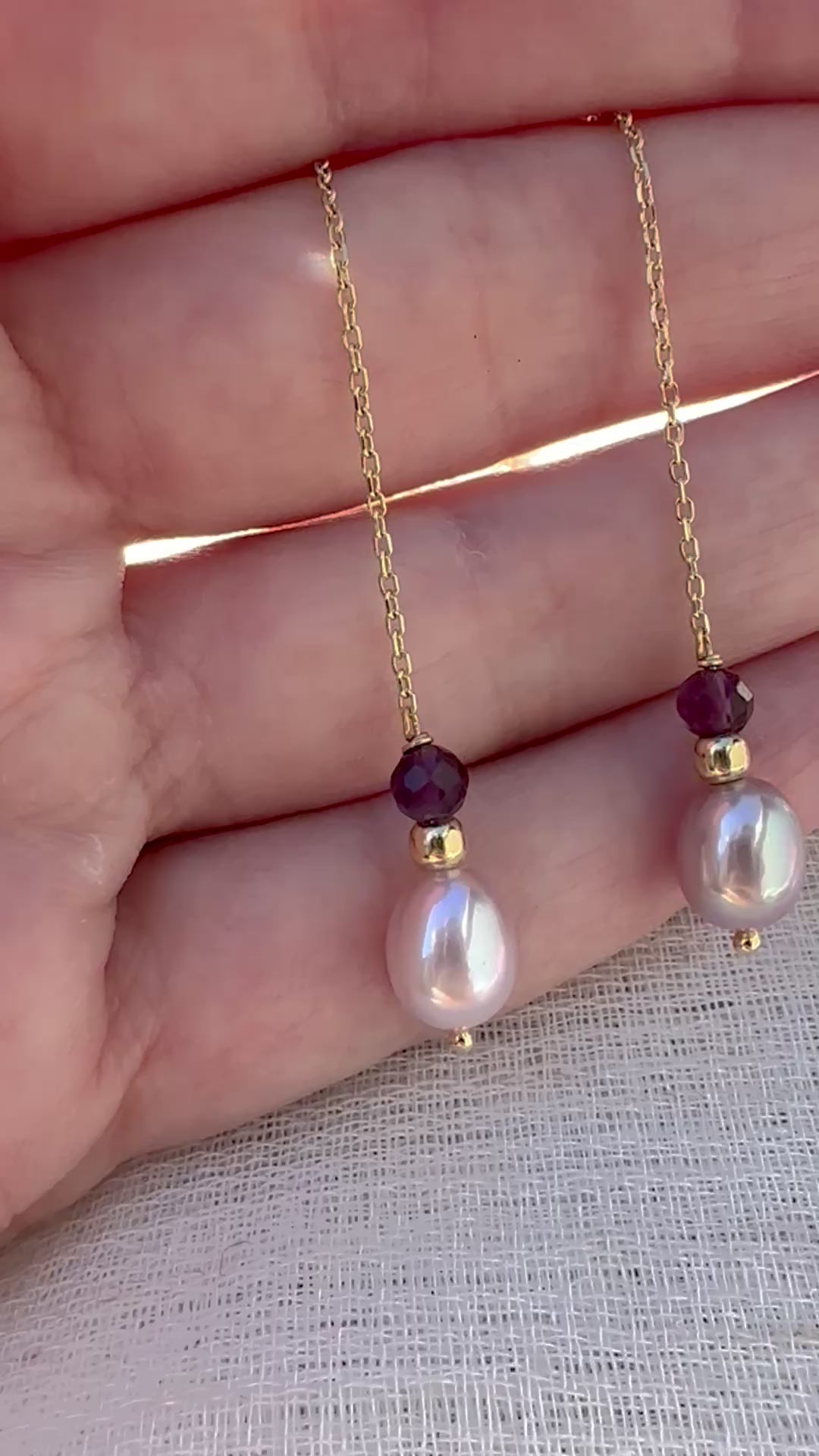 Threader Earrings handcrafted in 18 karat gold, featuring Pink pearls, a gold bead and a garnet bead, with a total length of 4.7" these earrings are perfect for a night  or an elegant casual look | Ella Creations Jewelry