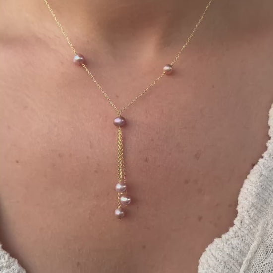 Exquisite Pearl Drop Necklace, featuring an 18k gold chain with Pink Pearls, one at each side of the chain and with drop Style Pink Pearls. This Necklace can be ordered in 18K Yellow gold or 18k Rose gold.