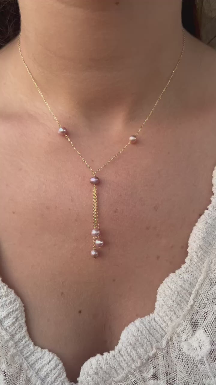 Exquisite Pearl Drop Necklace, featuring an 18k gold chain with Pink Pearls, one at each side of the chain and with drop Style Pink Pearls. This Necklace can be ordered in 18K Yellow gold or 18k Rose gold.