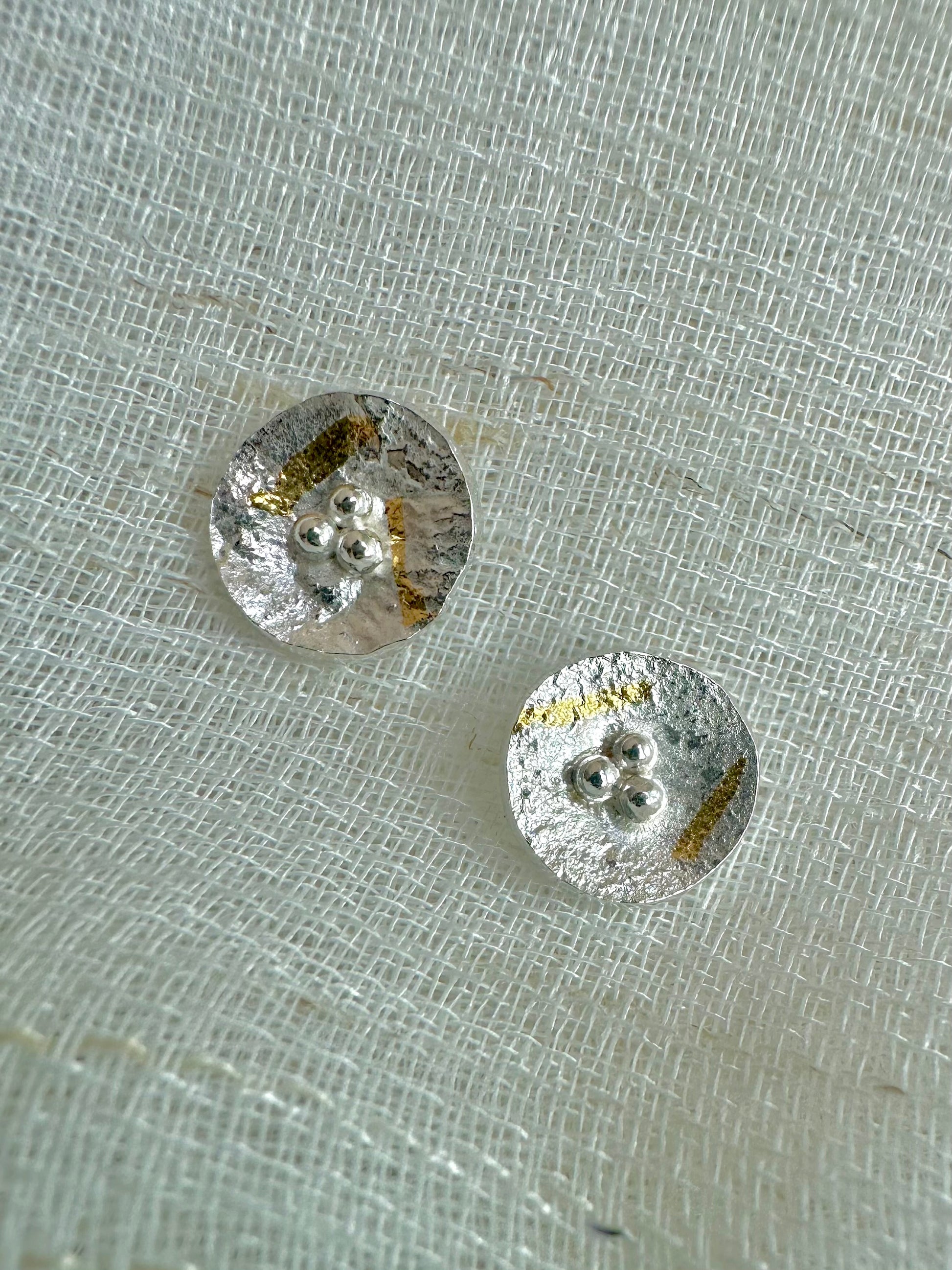 Round silver earrings slightly concave with gold foil | Ella Creations Jewelry 