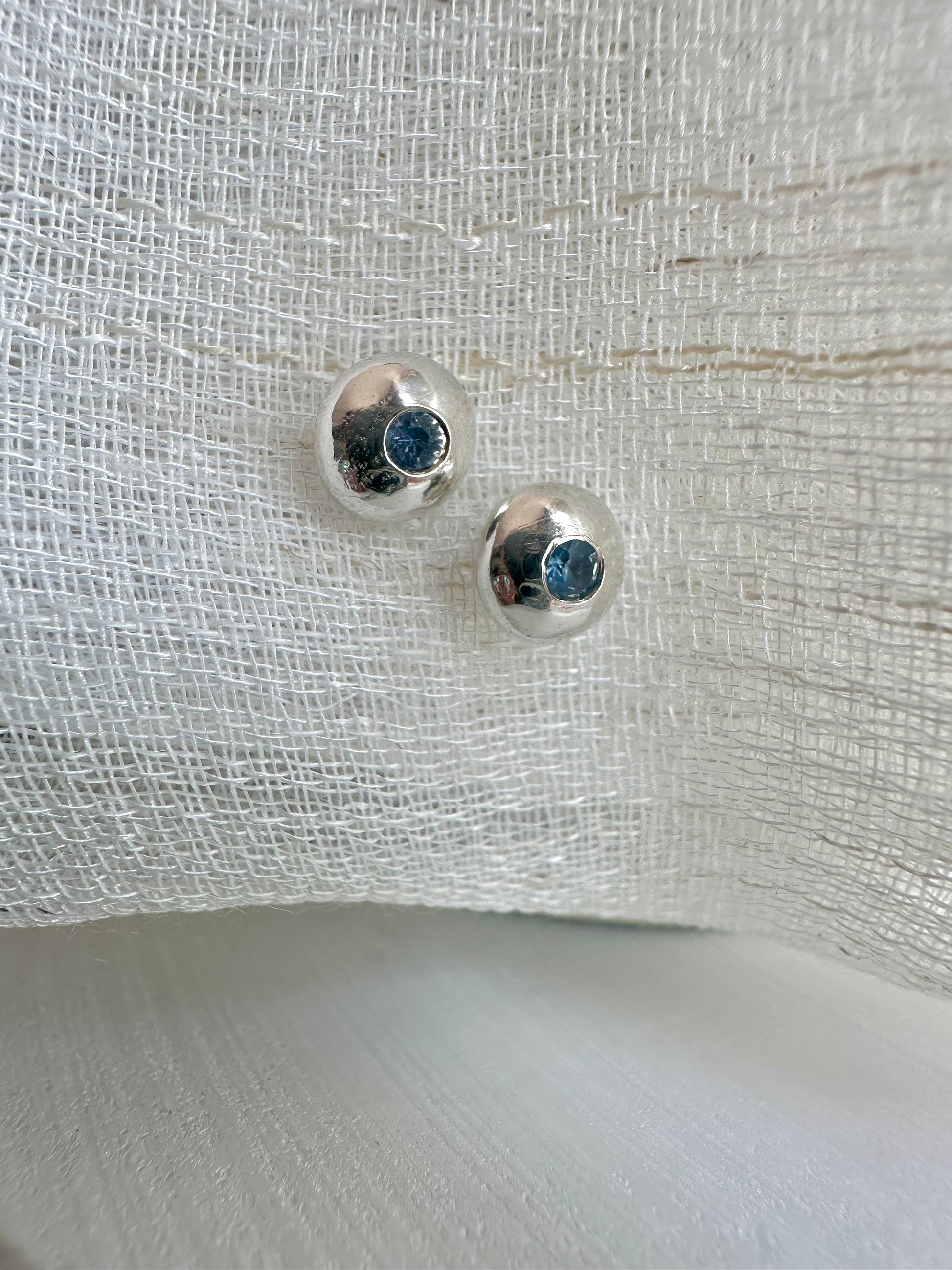 Button handcrafted recycled sterling silver with a flushed sapphire center stone | ella Creations Jewelry 