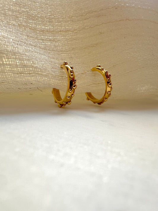 Solid gold hoop earrings with an 11mm diameter handcrafted in 18 karat yellow gold and can be customized in rose and white gold | Ella Creations Jewelry